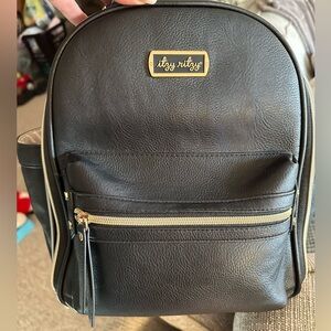 Itzy Ritzy Mini Diaper Bag in black/gold